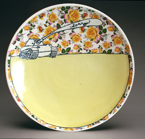 porcelain plate with inlaid drawing of tank with a voice bubble sorry and surrounded by vintage yellow rose decals